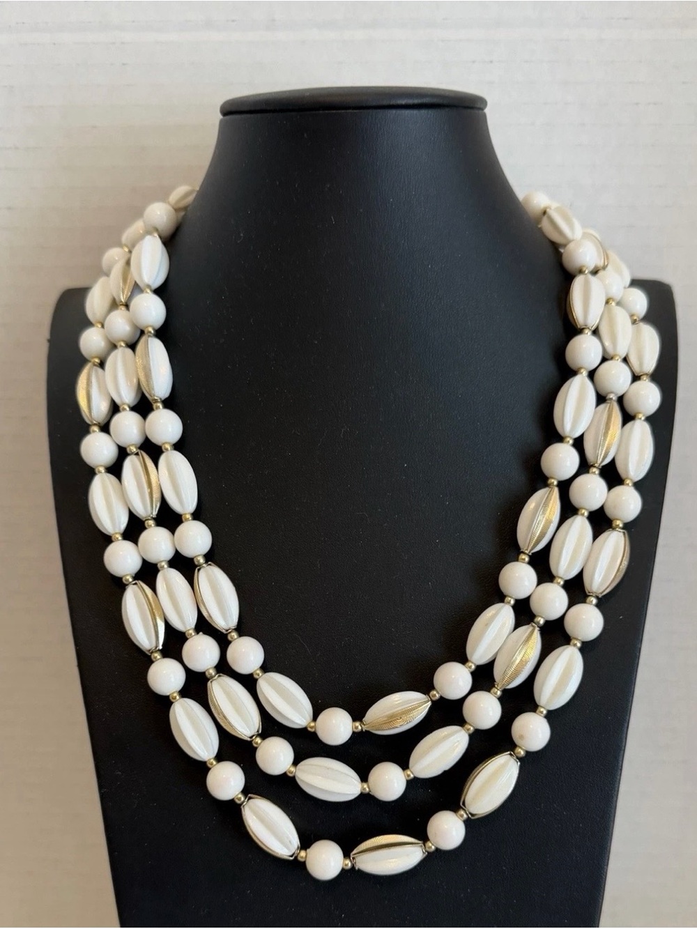 Vintage Hong Kong White Lucite Gold Tone Caged Bead Multi Strand Necklace